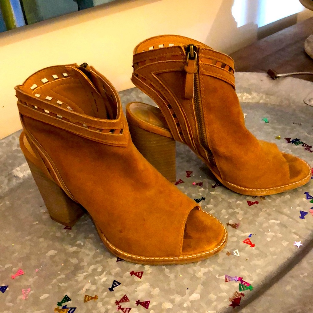Dolce Vita zip up booties with open toe.